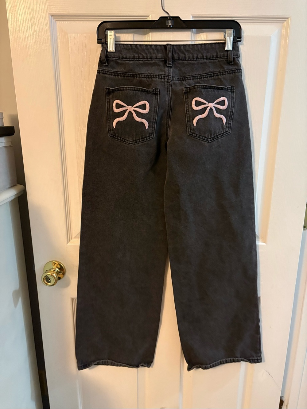 Edikted Black Wide-Leg Jeans with Pink Bow Pockets